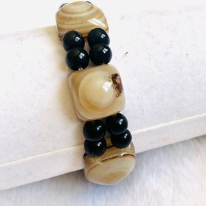 Sardonyx bracelet is stretchable and fits to most of the sizes.